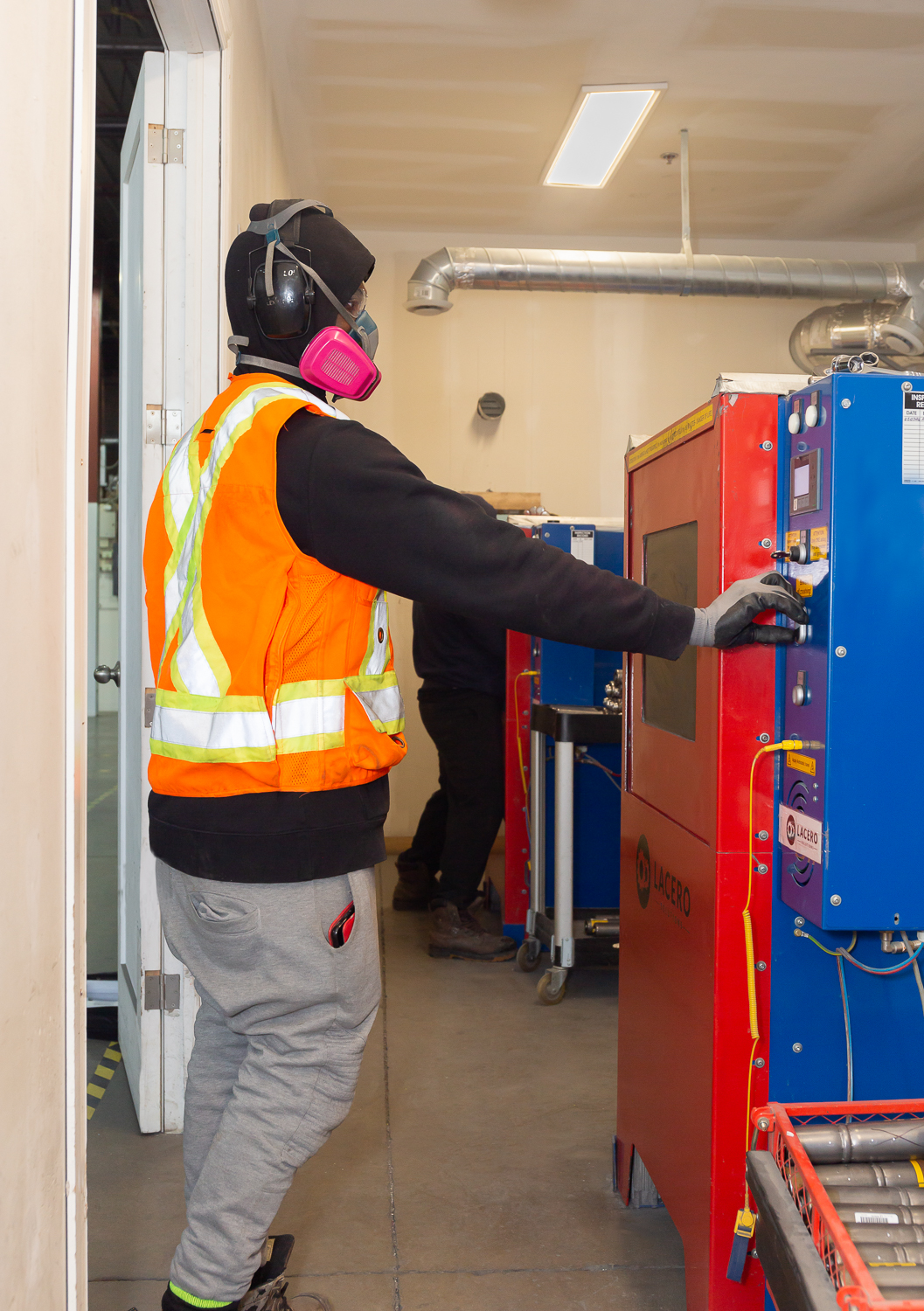 Operators deploying machines for airbag destruction.